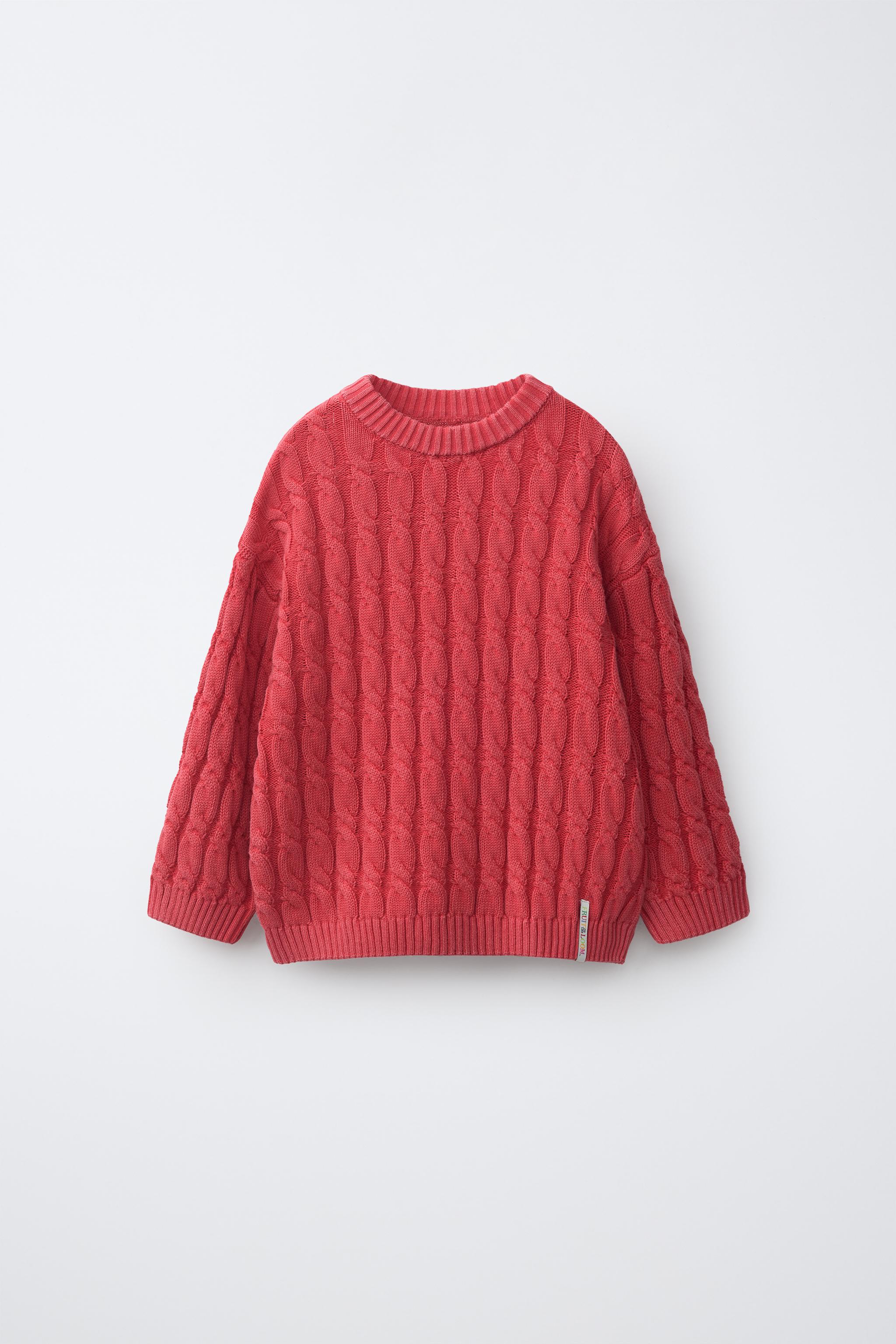 PULL EN MAILLE À TORSADES ET ÉTIQUETTE FRUIT OF THE LOOM™